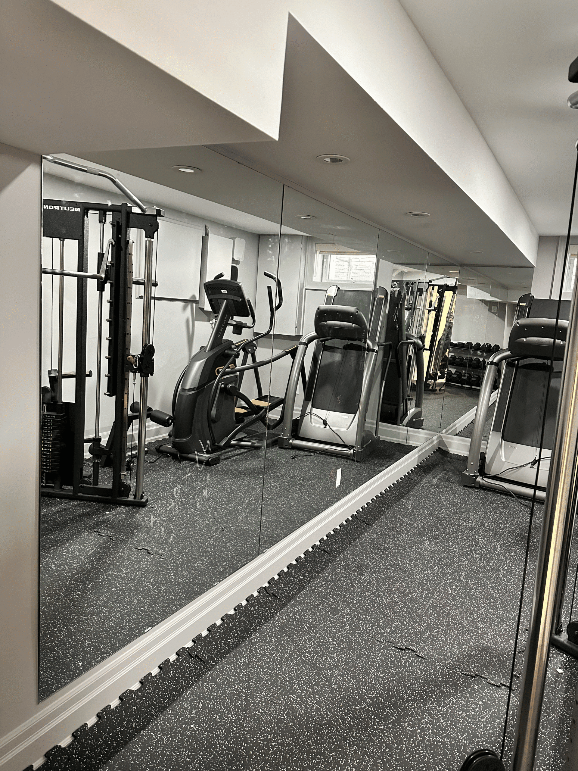 Wall-mounted mirror installed in a Newmarket home, designed and fitted by Zelux Railings to enhance space, light, and utility.